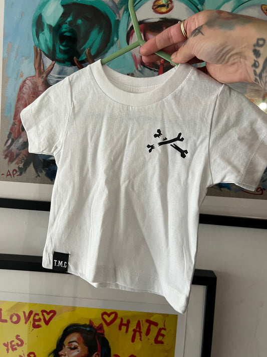 Sample sale item. Age 3-6 months cross bones tee.